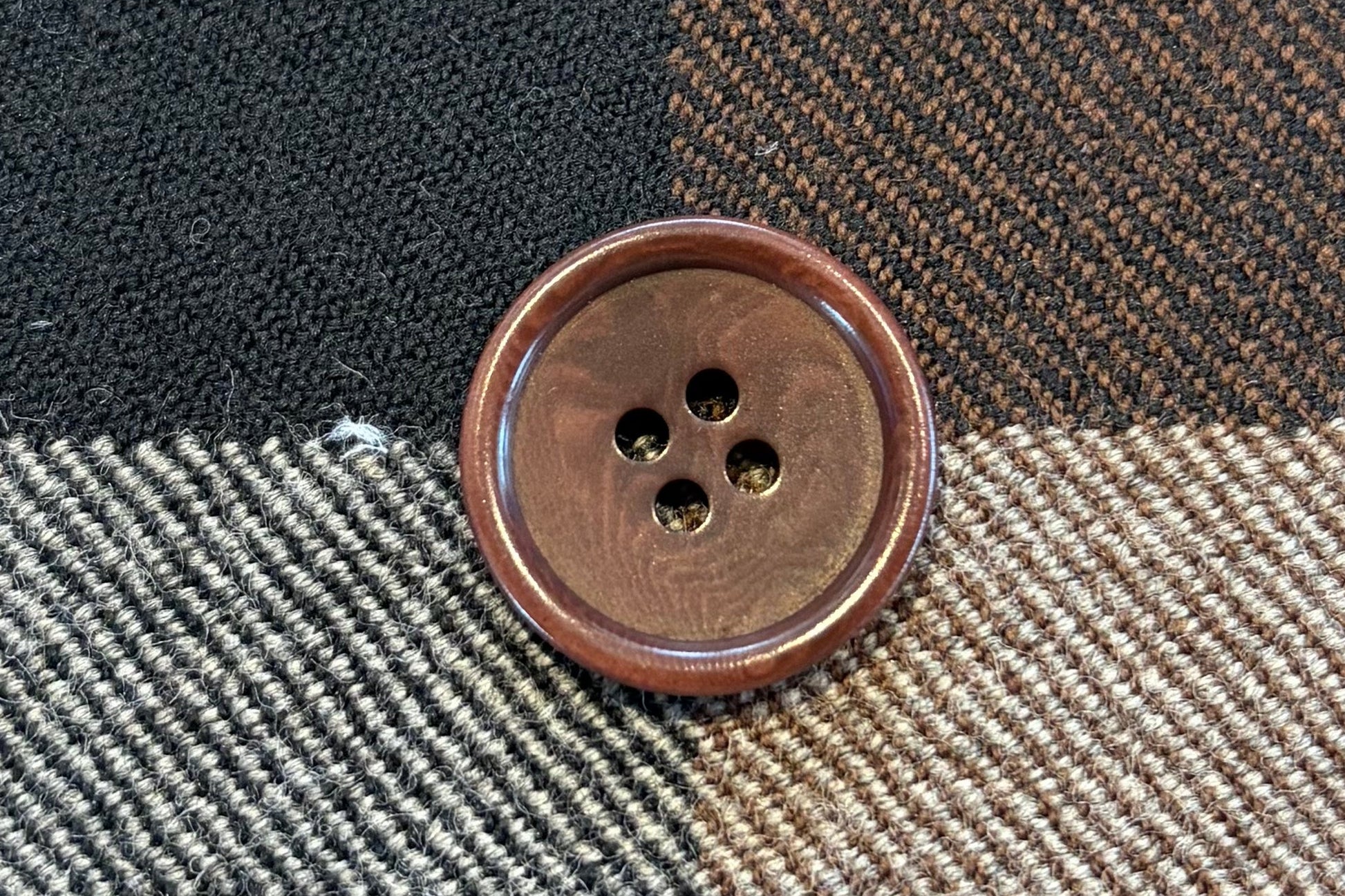 Plaid fabric with a button in the center