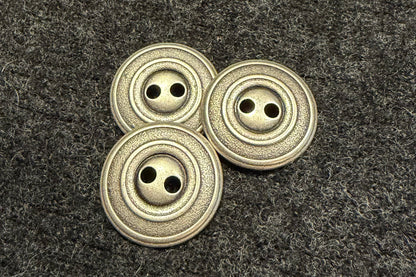 Bouton de veste ou de pantalon à deux trous