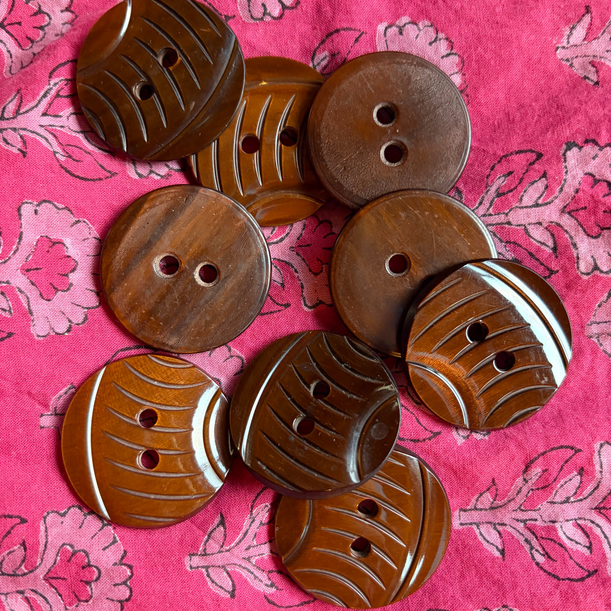 Natural brown carved casein shank buttons, 34 mm, handmade in Argentina.