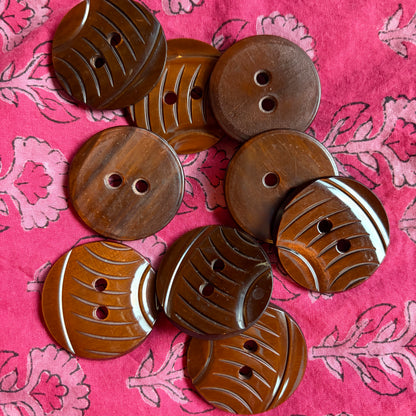 Natural brown carved casein shank buttons, 34 mm, handmade in Argentina.