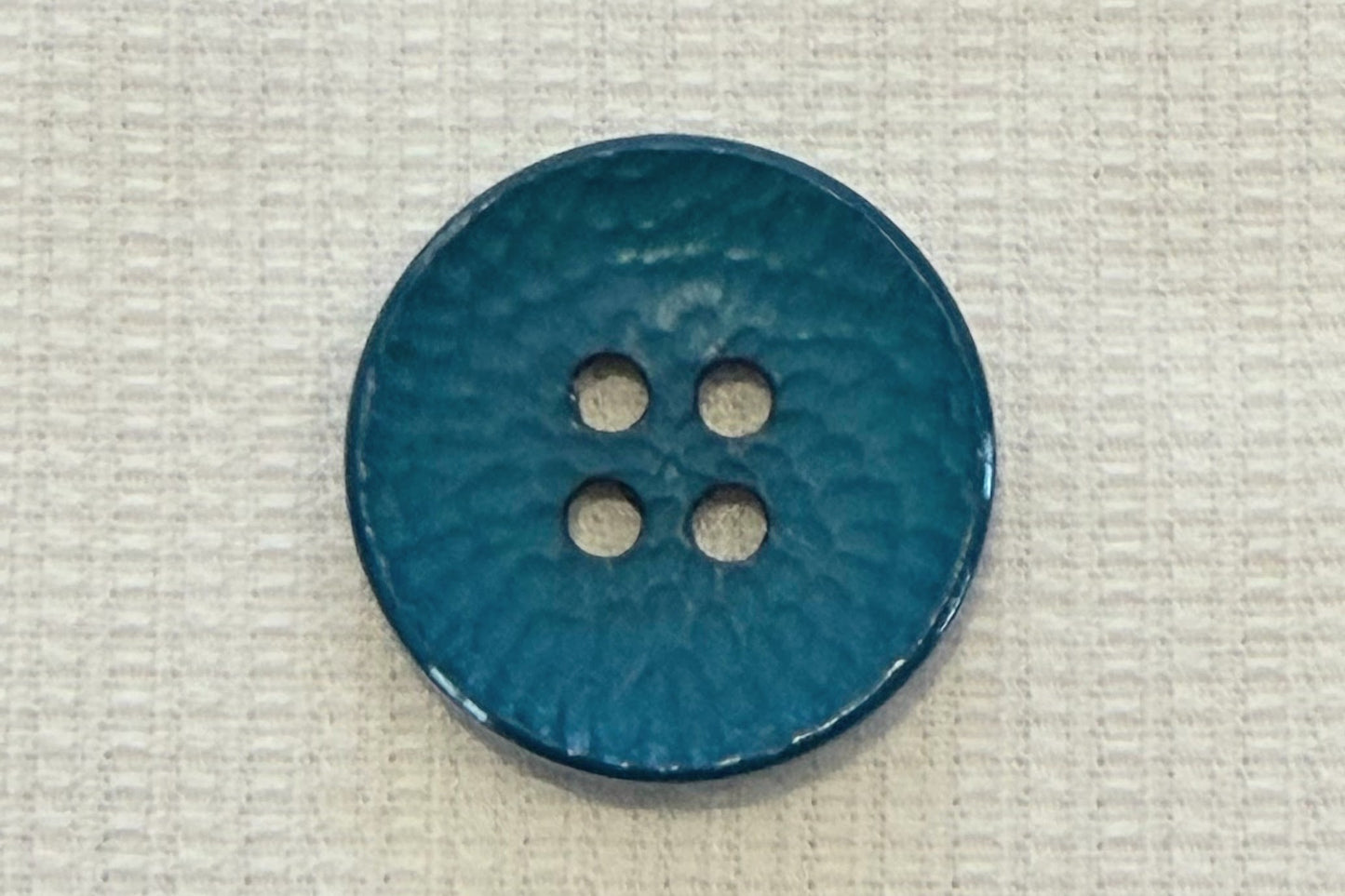 Bouton texturé concave (13 couleurs)